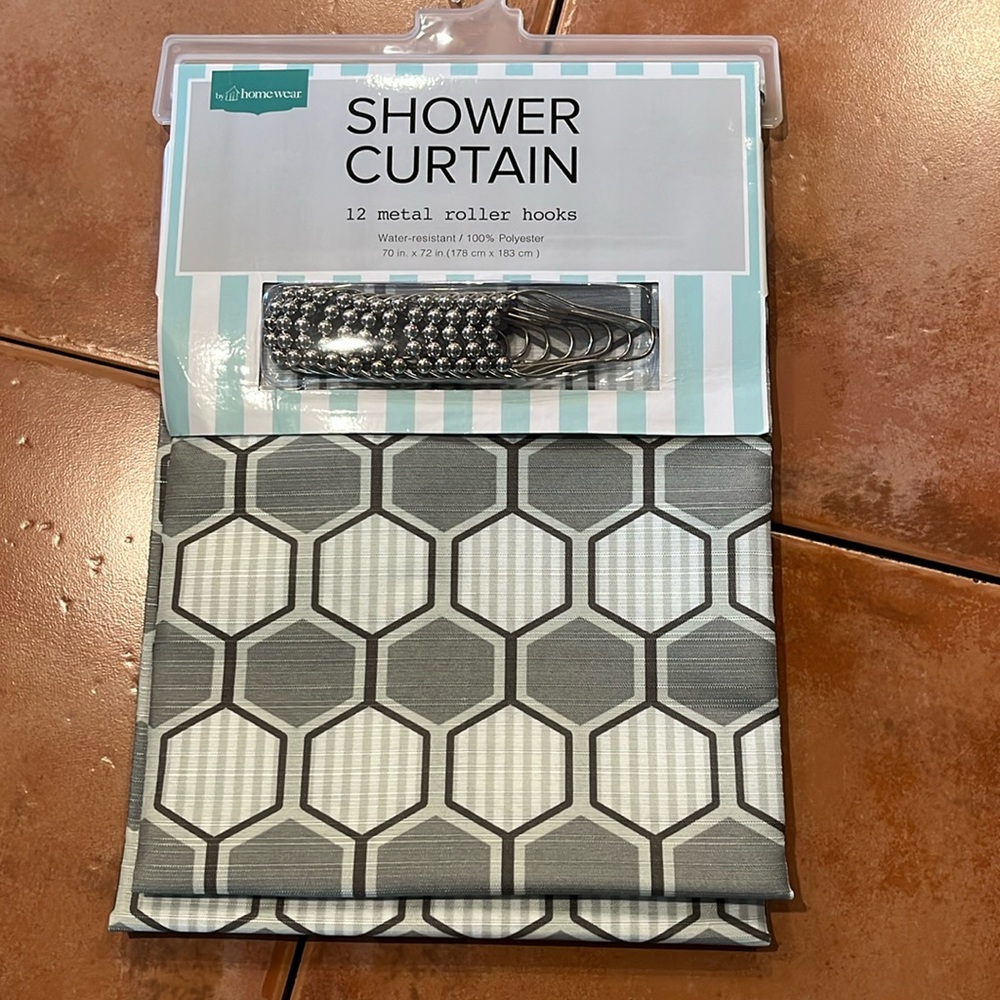 Brand new shower curtain with 12 metal roller hooks
